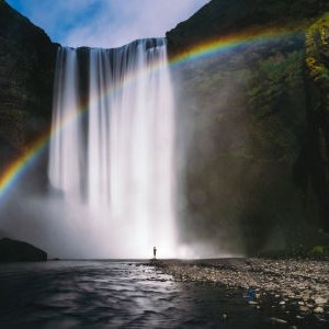 A rainbow over a waterfall